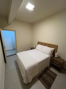 Ένα ή περισσότερα κρεβάτια σε δωμάτιο στο Tu lugar en Ciudad Del Este Dpto 201