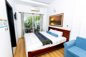 Postel nebo postele na pokoji v ubytování Bakheng Private Pool Villa 4-Bedroom + 23 fotografií