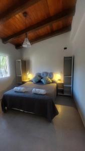 Voodi või voodid majutusasutuse Ribera de Cacheuta Lodge toas +37 fotot