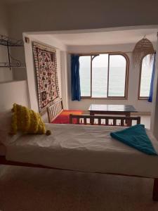 Postel nebo postele na pokoji v ubytování Taghazout beachfront Apartments
