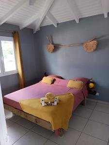 Ένα ή περισσότερα κρεβάτια σε δωμάτιο στο Villa Ékla