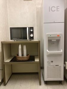 O bucătărie sau chicinetă la Smile Hotel Nabari