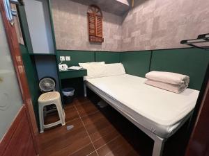 מיטה או מיטות בחדר ב-Venetian Hostel