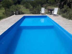 Swimmingpoolen hos eller tæt på La Paz Casa de campo