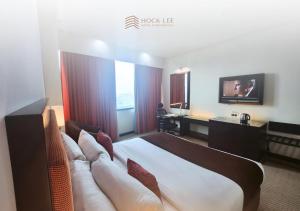 TV a/nebo společenská místnost v ubytování Hock Lee Hotel & Residences