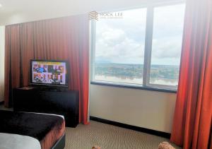 TV a/nebo společenská místnost v ubytování Hock Lee Hotel & Residences