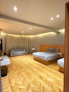 Letto o letti in una camera di NUT Pyramids Hotel