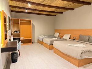 Letto o letti in una camera di NUT Pyramids Hotel