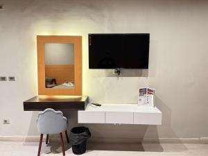 TV o dispositivi per l'intrattenimento presso NUT Pyramids Hotel
