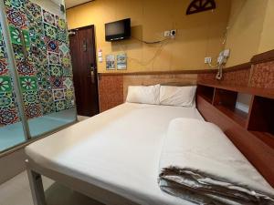 3D Inn Hong Kong - Dragon客房内的一张或多张床位
