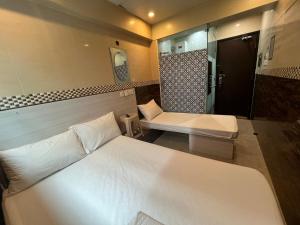 3D Inn Hong Kong - Dragon客房内的一张或多张床位