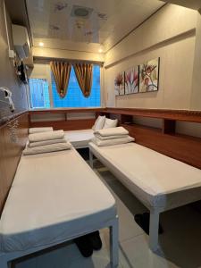 3D Inn Hong Kong - Dragon客房内的一张或多张床位