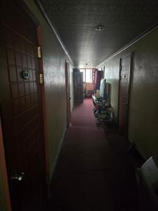 a hallway in an office building with a hallwaygue at Gallery motel in Incheon +1 photo