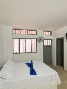 Postel nebo postele na pokoji v ubytování Hotel Dauphin Rest + 13 fotografií
