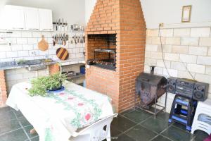 Kuchyň nebo kuchyňský kout v ubytování Chacara bella vitta