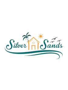 a logo for a beach resort with a house and the words silver inn sands at Silver Sand, Placencia in Placencia Village