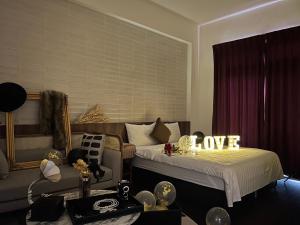 Voodi või voodid majutusasutuse Choco Style Inn toas