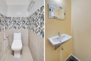 Koupelna v ubytování Super Hotel O Karakambadi Road Near Leela Mahal Circle + 26 fotografií