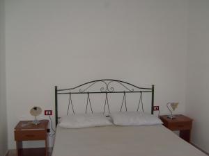 Posteľ alebo postele v izbe v ubytovaní B&B La Seta Rossa