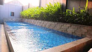 Piscina a VNC Alam Sutera Hotel Powered by Archipelago o a prop