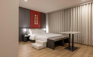 Postel nebo postele na pokoji v ubytování Koum Ryokan Hotel Gijang by Aank