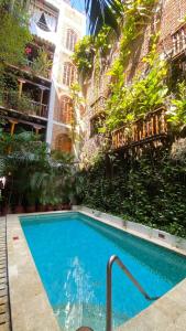 Bazén v ubytování Hotel Don Pedro De Heredia nebo v jeho okolí