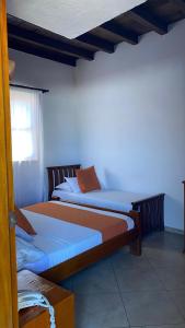 Voodi või voodid majutusasutuse Hotel Don Pedro De Heredia toas