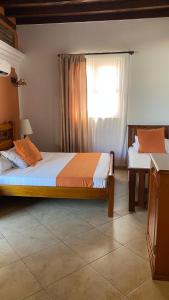 Voodi või voodid majutusasutuse Hotel Don Pedro De Heredia toas