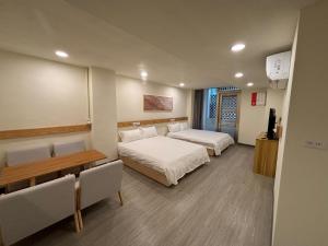 Postel nebo postele na pokoji v ubytování 慢且洄瀾文旅 Bantshiann Hualie Hotel