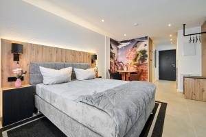 Postel nebo postele na pokoji v ubytování F33 by Freiburg Appartements