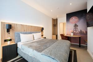 Postel nebo postele na pokoji v ubytování F33 by Freiburg Appartements
