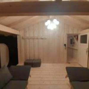 a living room with a couch and a table at Ferienhaus Sepp in Regen