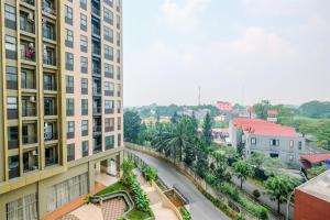 a view of a city street from a building at Modern and Comfort 2BR Transpark Cibubur Apartment By Travelio in Depok
