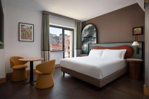 The Spring House Hotel Rome Vatican, Tapestry Collection Hilton客房内的一张或多张床位