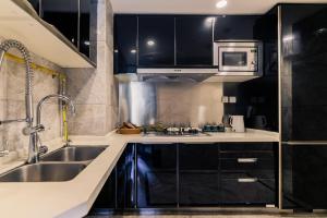 Chengdu Yunxi Luxury High-end Suite Apartment Hotel廚房或簡易廚房
