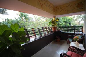 Bella Homestay Kerala的阳台或露台