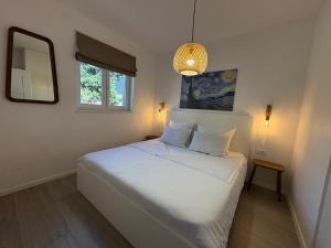 Posteľ alebo postele v izbe v ubytovaní Villa Štorija + 37 fotografií