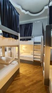 Postel nebo postele na pokoji v ubytování Gunel's Hostel Baku