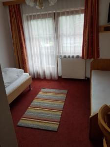 Postel nebo postele na pokoji v ubytování Haus Theresia