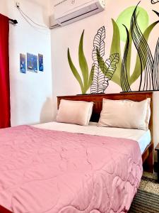Postel nebo postele na pokoji v ubytování Cozy Nest