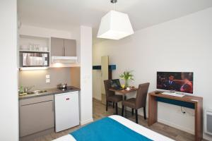 Kuchyň nebo kuchyňský kout v ubytování Appart Hotel Odalys City Amiens Blamont + 22 fotografií