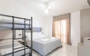 Postel nebo postele na pokoji v ubytování Hotel Rosalba san mauro mare + 5 fotografií