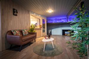 Area soggiorno di Tune Hotell Sarpsborg