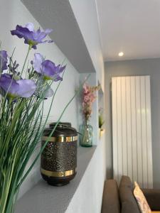 Posezení v ubytování Gites Spa Strasbourg - Villa Cerf - SPA Privé, Sauna, Borne d'arcade, Babyfoot