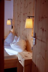 Letto o letti in una camera di Hotel Zur Post