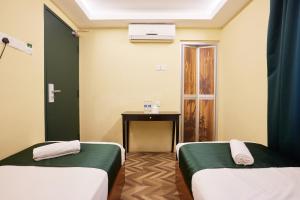 Postel nebo postele na pokoji v ubytování Fast Hotel Setapak Near Tunku Abdul Rahman UMT KL