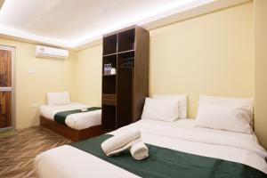 Postel nebo postele na pokoji v ubytování Fast Hotel Setapak Near Tunku Abdul Rahman UMT KL + 18 fotografií
