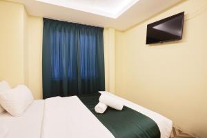 TV a/nebo společenská místnost v ubytování Fast Hotel Setapak Near Tunku Abdul Rahman UMT KL
