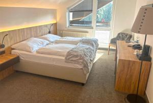 Posteľ alebo postele v izbe v ubytovaní Wellness Hotel Svornost