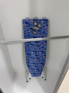 a blue and white shelf in a room at Podium Home2 for 7pax at AEON Mall Kuching in Kuching +44 photos